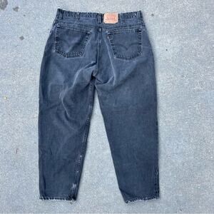 Vintage 90s Levi’s black 560 loose fit tapered leg jeans 40x30